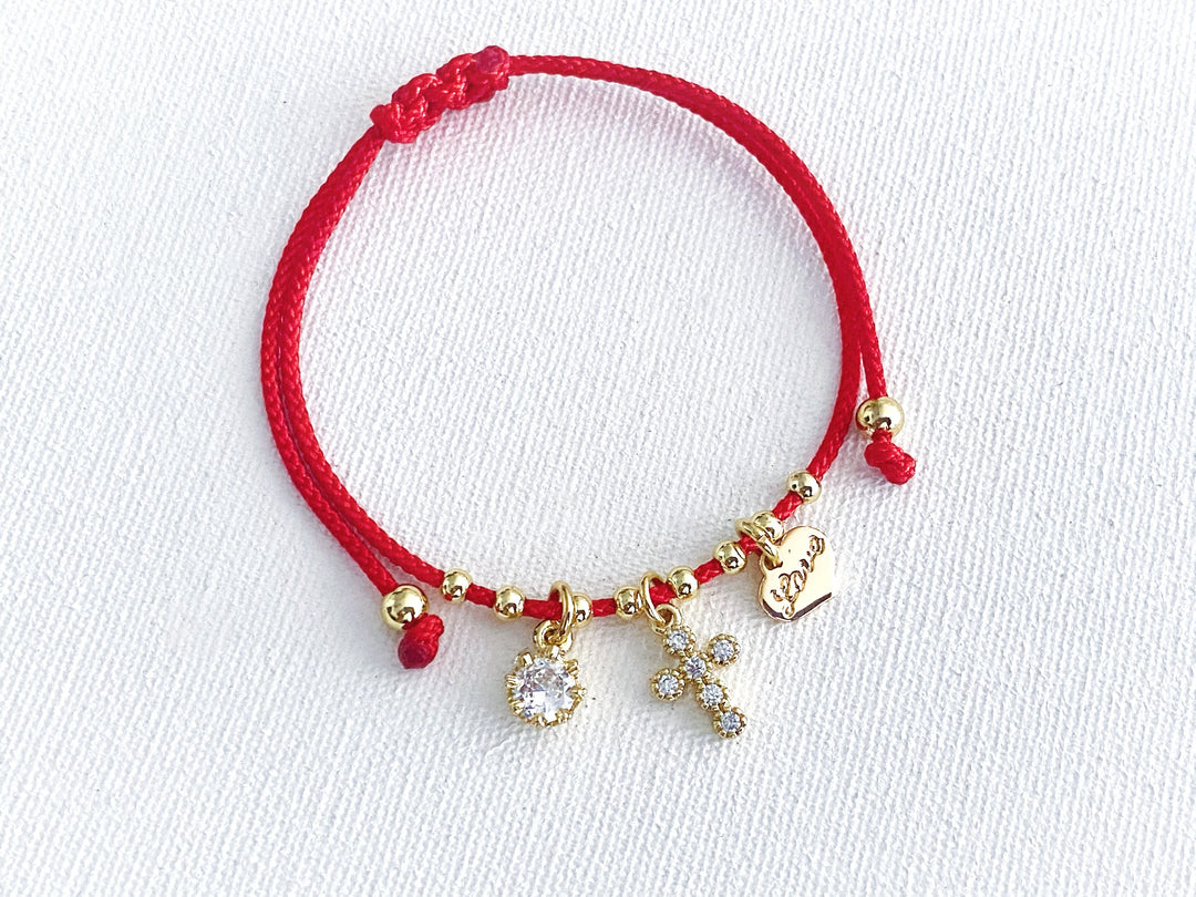 Pulsera Alba de hilo rojo con perla y cruz de zirconia