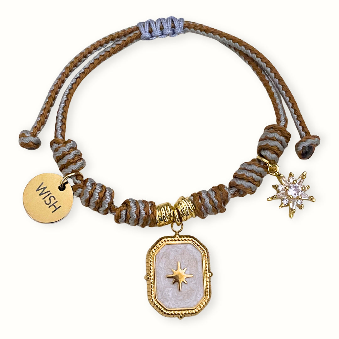 Brazalete Wish con estrella de zirconia y dijes de acero inoxidable