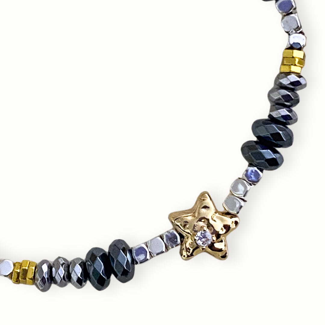 Detalles de Brazalete tejido de hematita con separador de estrella con zirconia