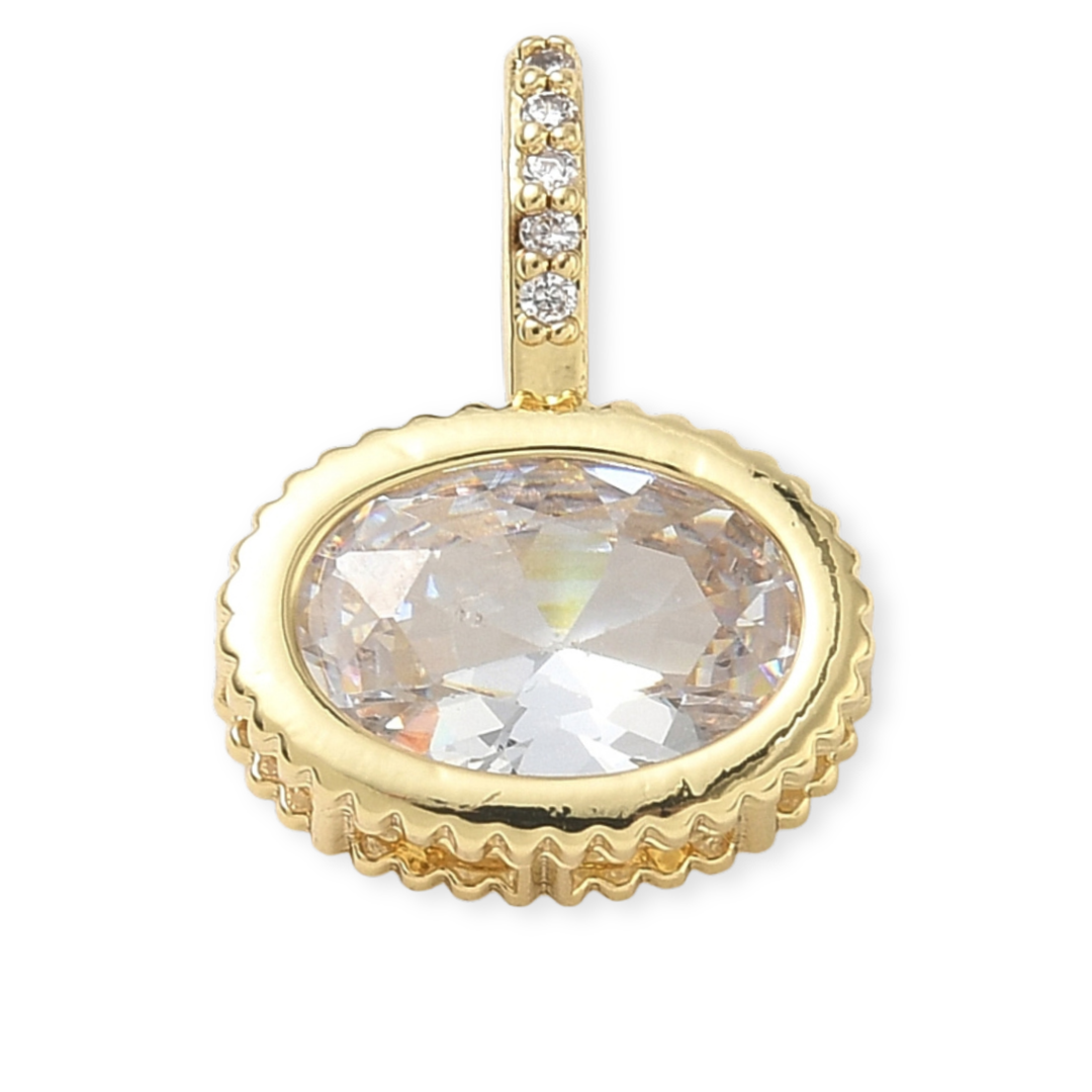 Dije ovalado de chapa de oro con zirconia