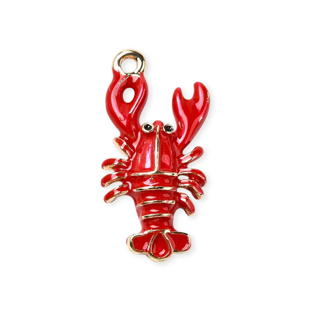 Dije de langosta de chapa de oro esmaltado en rojo sobre fondo blanco