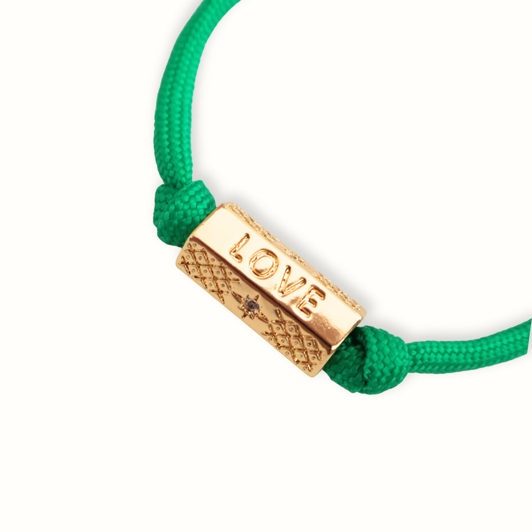 Pulsera Zirel con cordón paracord y dije dorado con zirconia