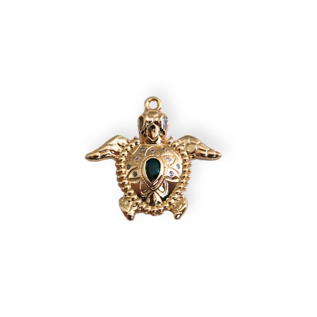 Dije tortuga en chapa de oro con zirconia brillante al centro