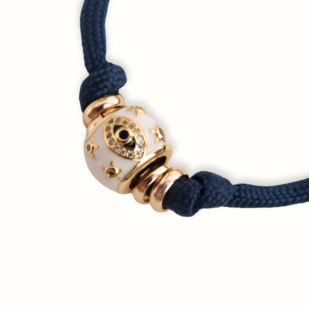 Pulsera Zarela con cordón paracord, separador esmaltado y argollas metálicas