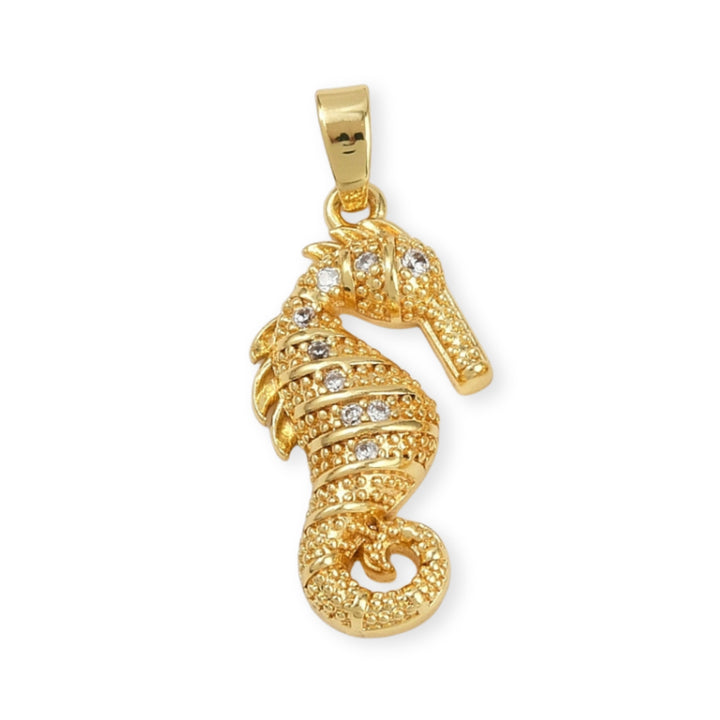 Dije caballito de mar dorado en chapa de oro con zirconia brillante