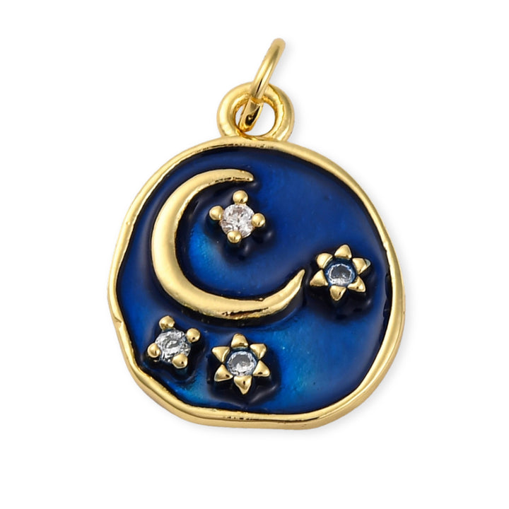 Dije circular con luna y estrellas en chapa de oro, zirconia y esmaltado