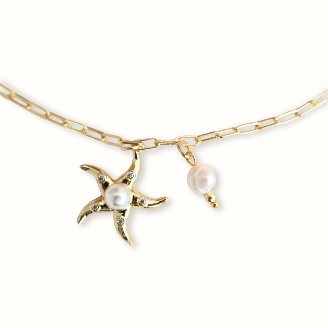 Collar Cleo con perla de río y estrella de mar dorada