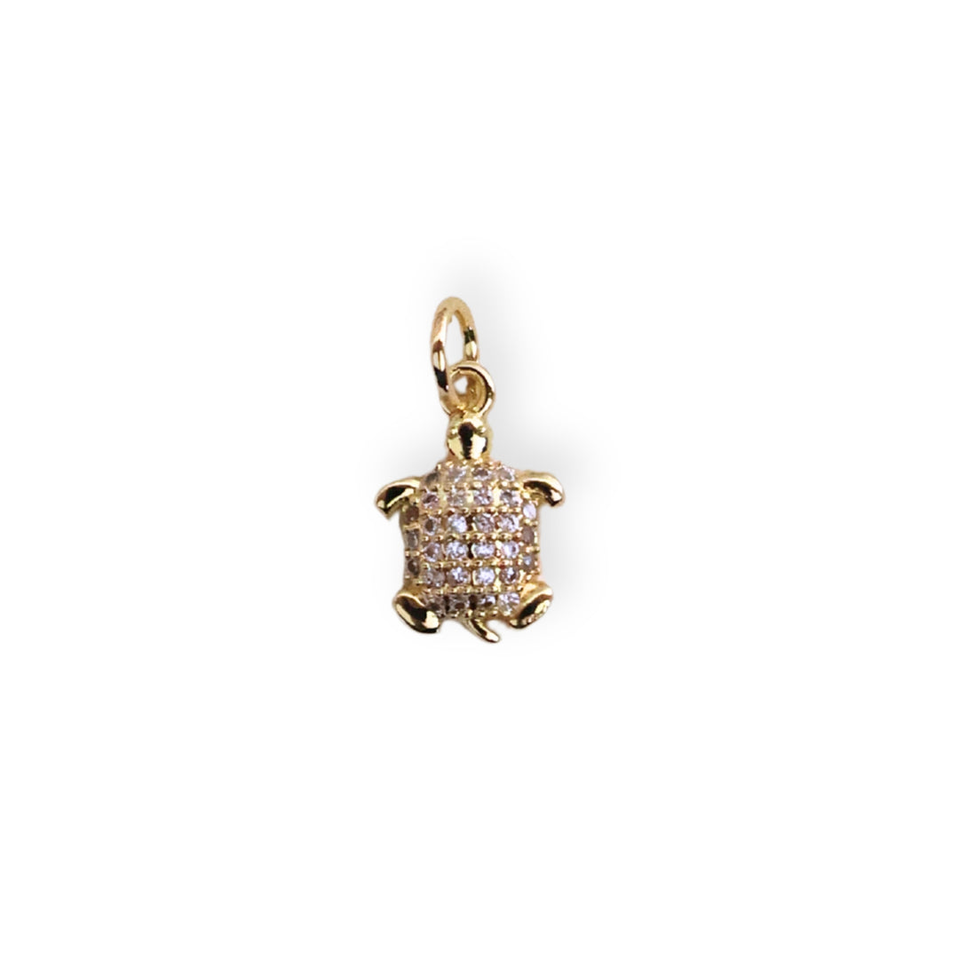 Dije tortuga en chapa de oro con zirconias brillantes