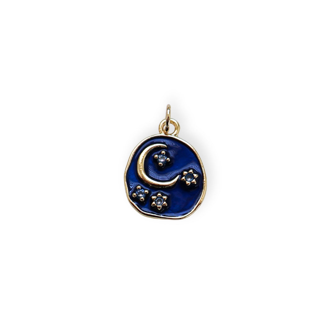 Dije circular con luna y estrellas en chapa de oro, zirconia y esmaltado