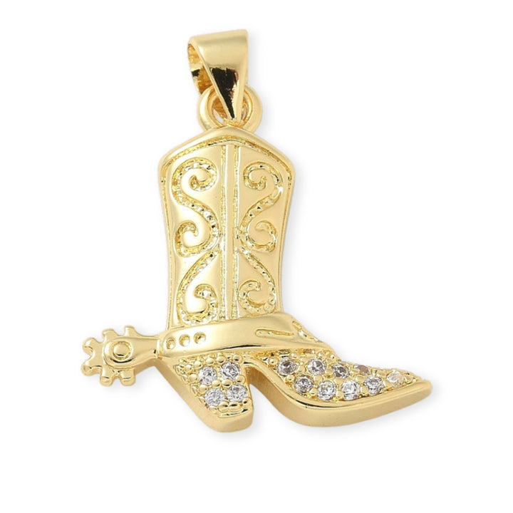 Dije dorado en forma de bota con zirconias incrustadas