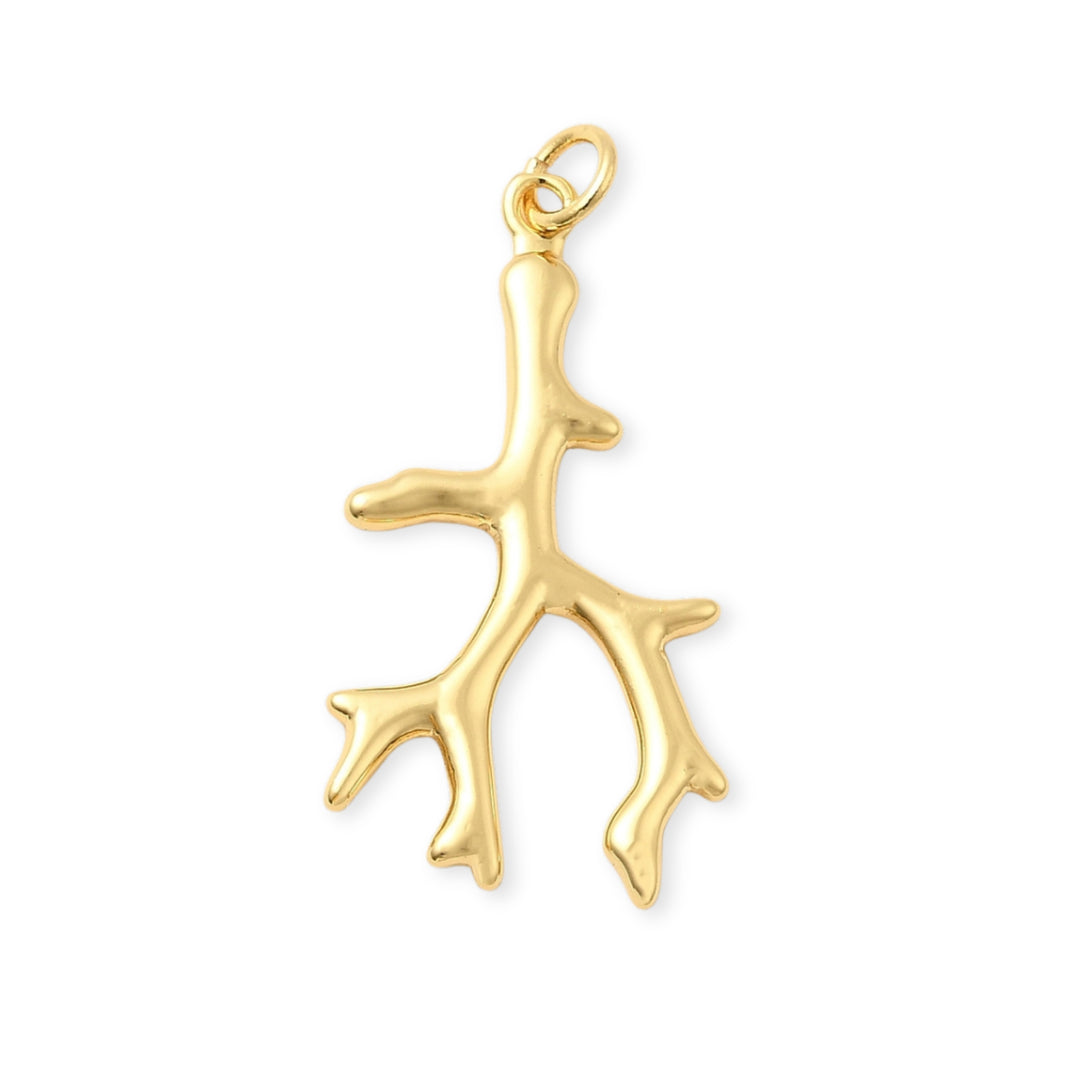 Dije dorado en forma de coral elaborado en chapa de oro