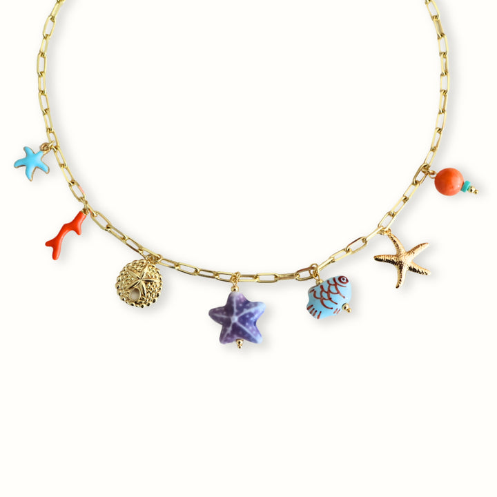 Collar Caria con estrellas de mar morada y azul