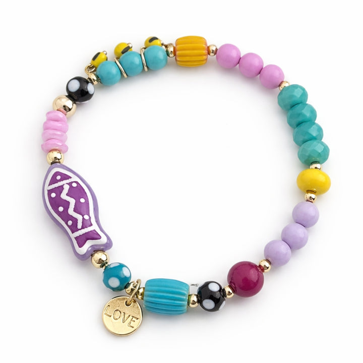 Brazalete marino con pez de murano, piedras naturales y dije Love de chapa de oro
