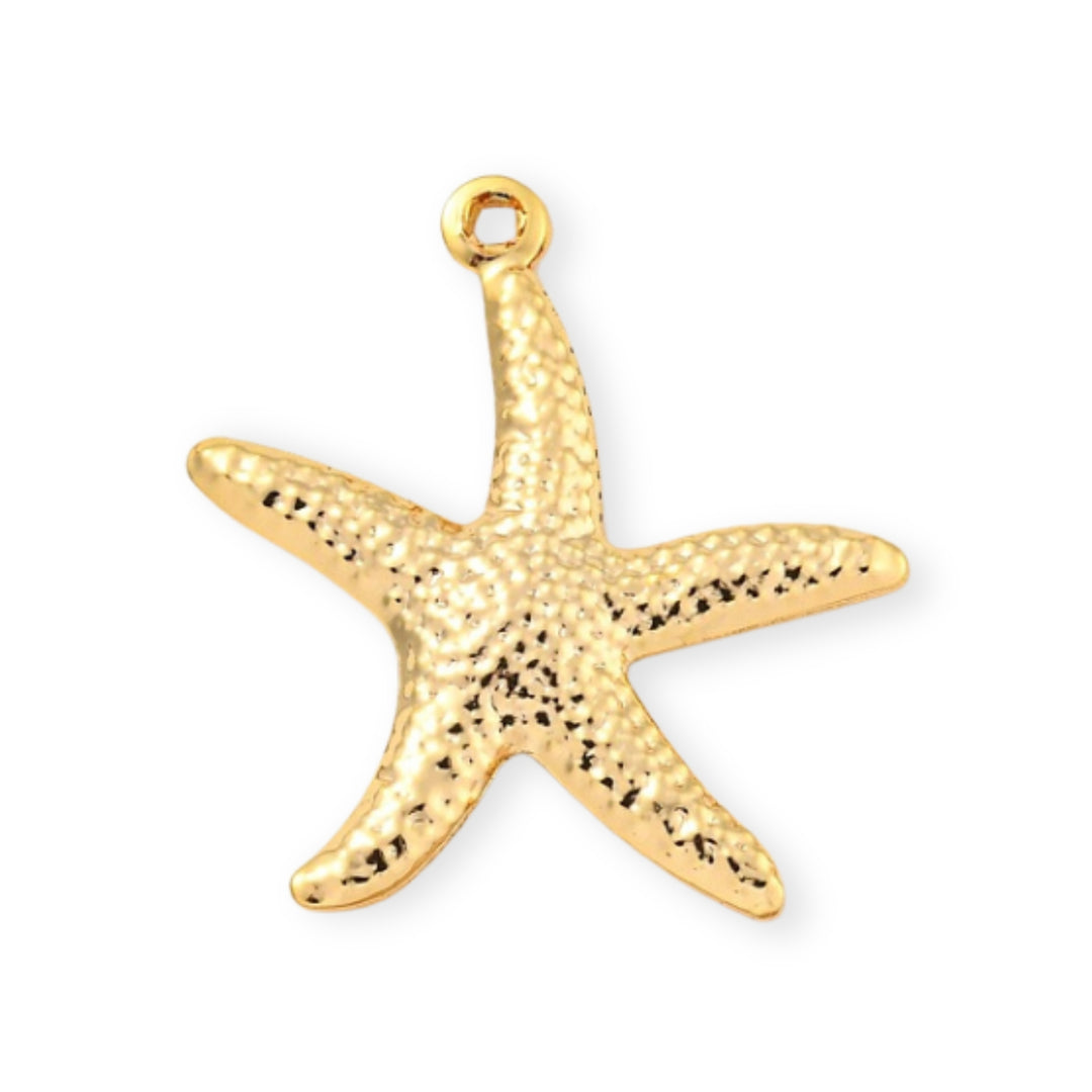 Dije dorado en forma de estrella de mar