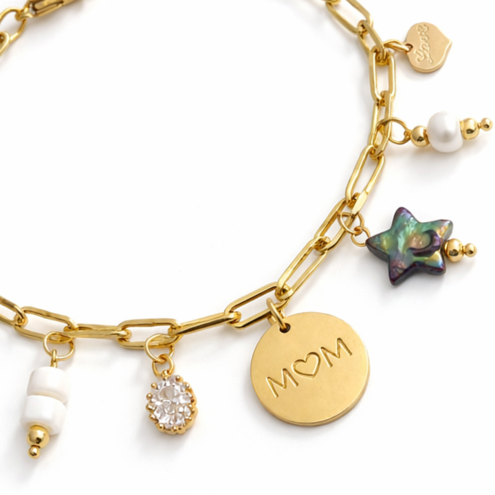 Pulsera Sofía con conchas, perla de río, corazón, zirconia y dije Mom de acero inoxidable