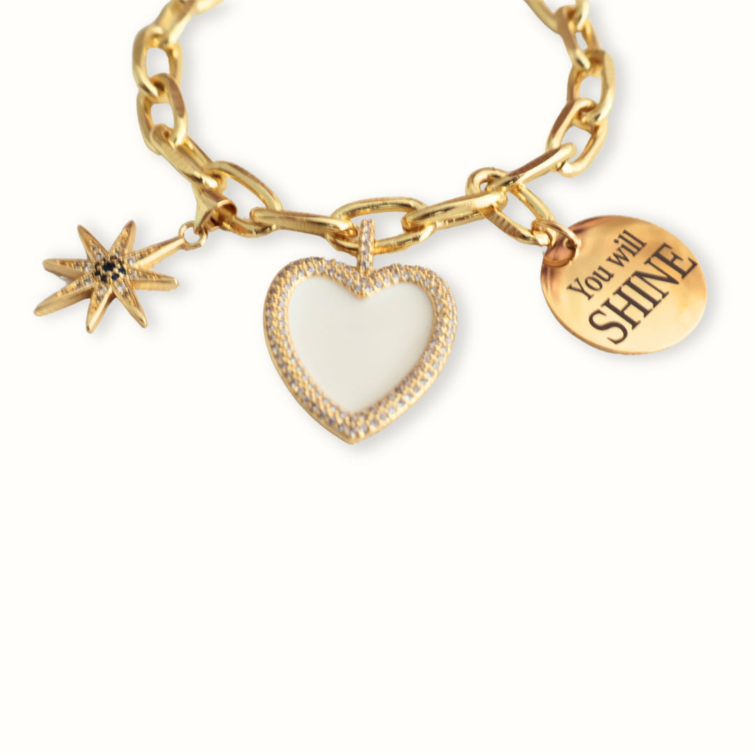 Pulsera Aureva con cadena dorada, estrella, corazón y placa motivacional