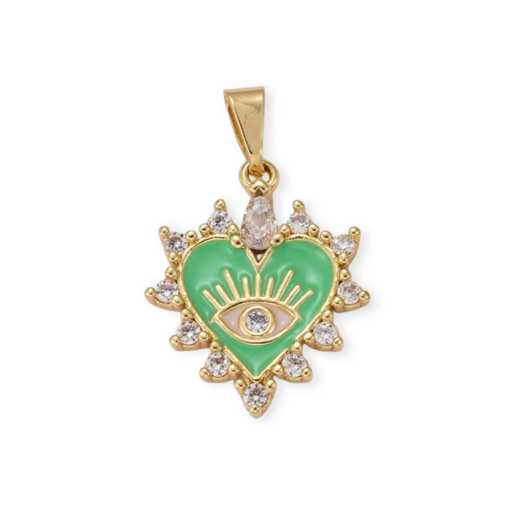 Dije de corazón con ojo de chapa de oro con zirconia y esmalte