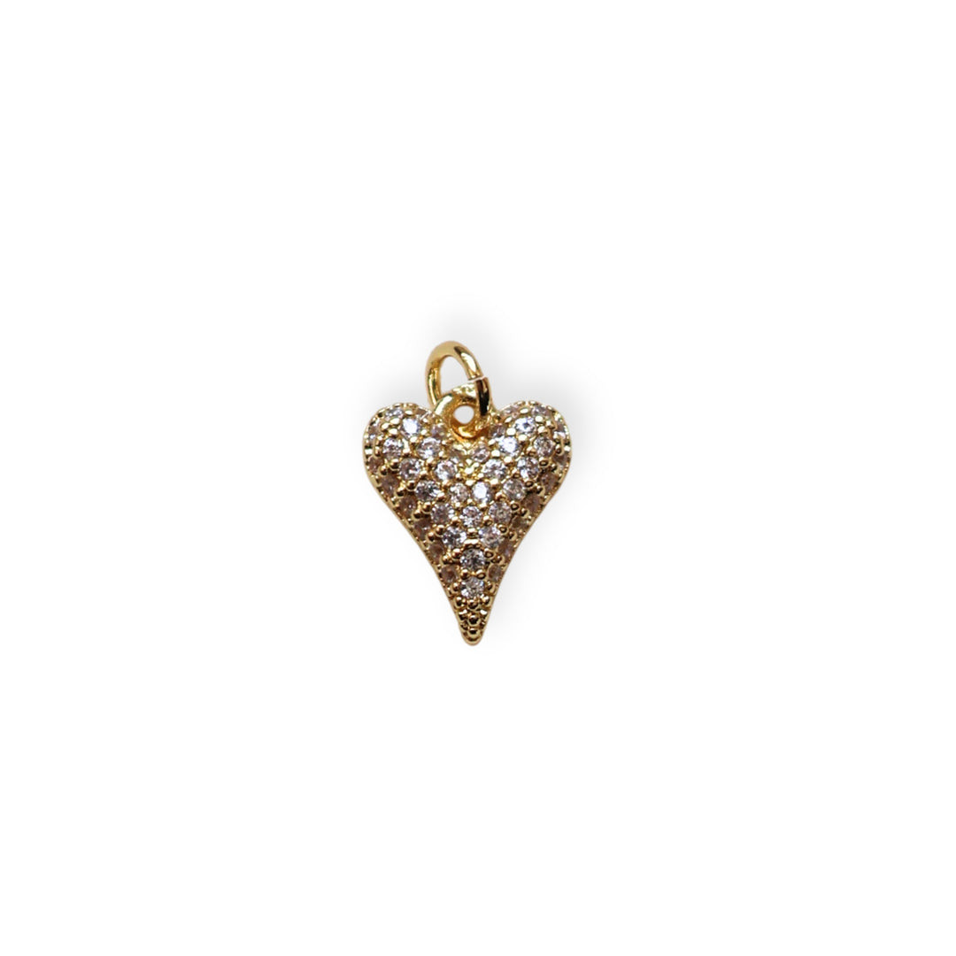 Dije en forma de corazón dorado con zirconia