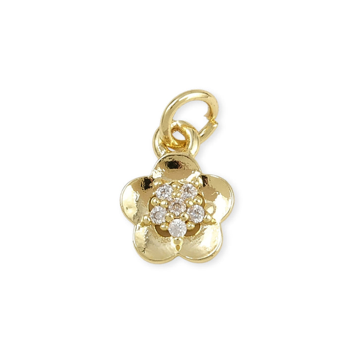 Dije de flor de chapa de oro con zirconia