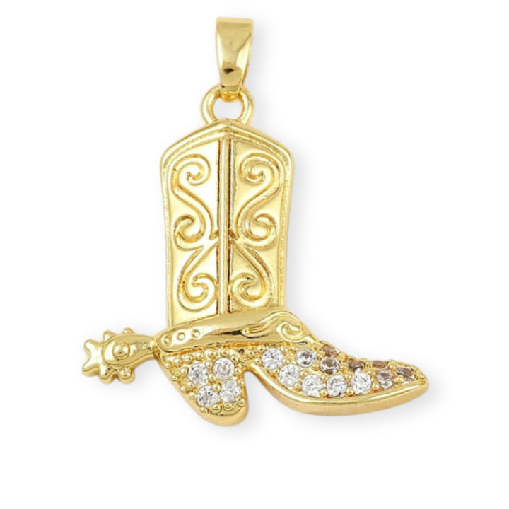 Dije dorado en forma de bota con zirconias incrustadas