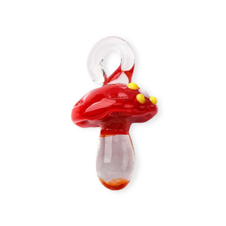 Dije de murano en forma de hongo con sombrero rojo y cuerpo transparente
