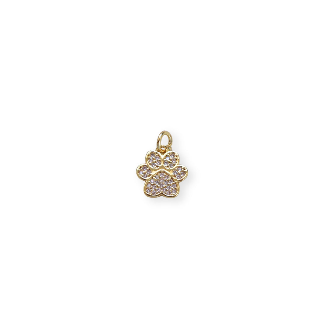 Dije huella de perro dorada con zirconia brillante