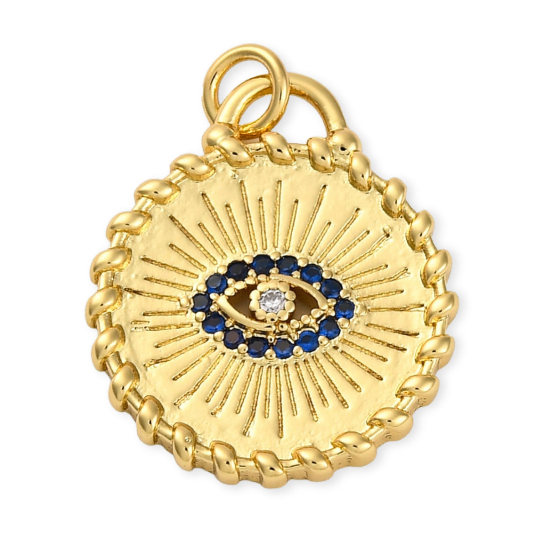 Dije circular dorado con ojo turco y zirconias en chapa de oro