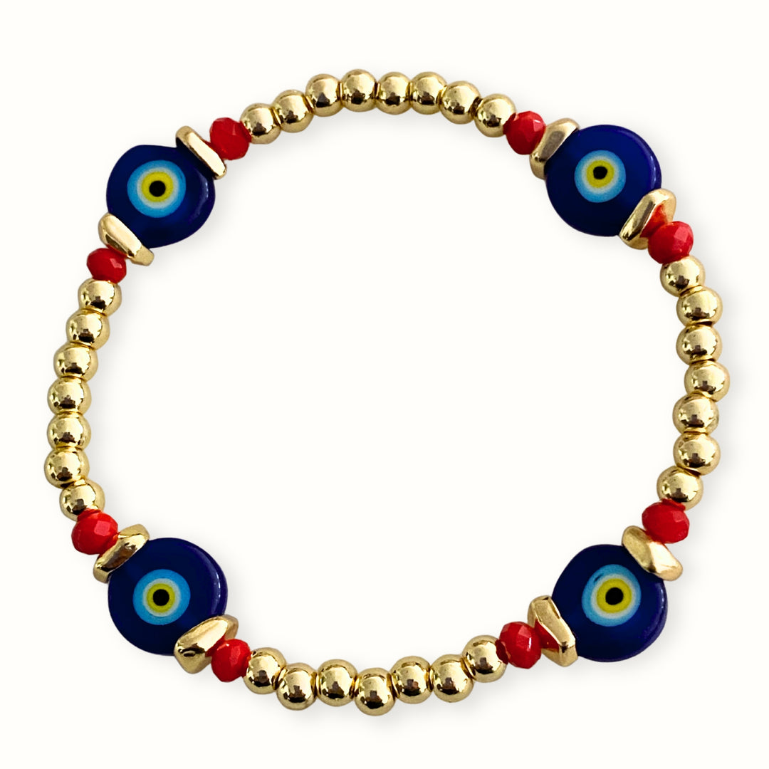 Pulsera elástica con ojo turco de murano y cristal facetado.