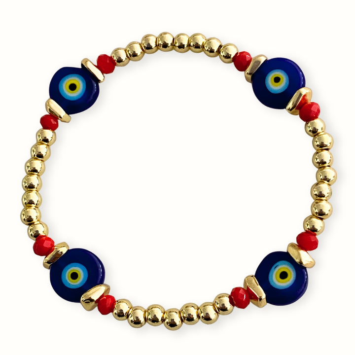 Pulsera elástica con ojo turco de murano y cristal facetado.