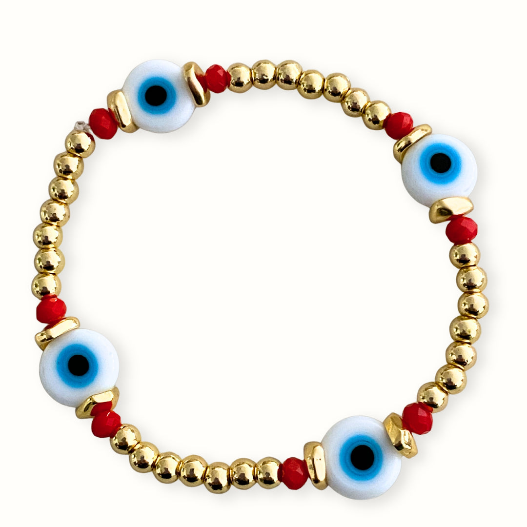 Pulsera elástica con ojo turco de murano y cristal facetado.