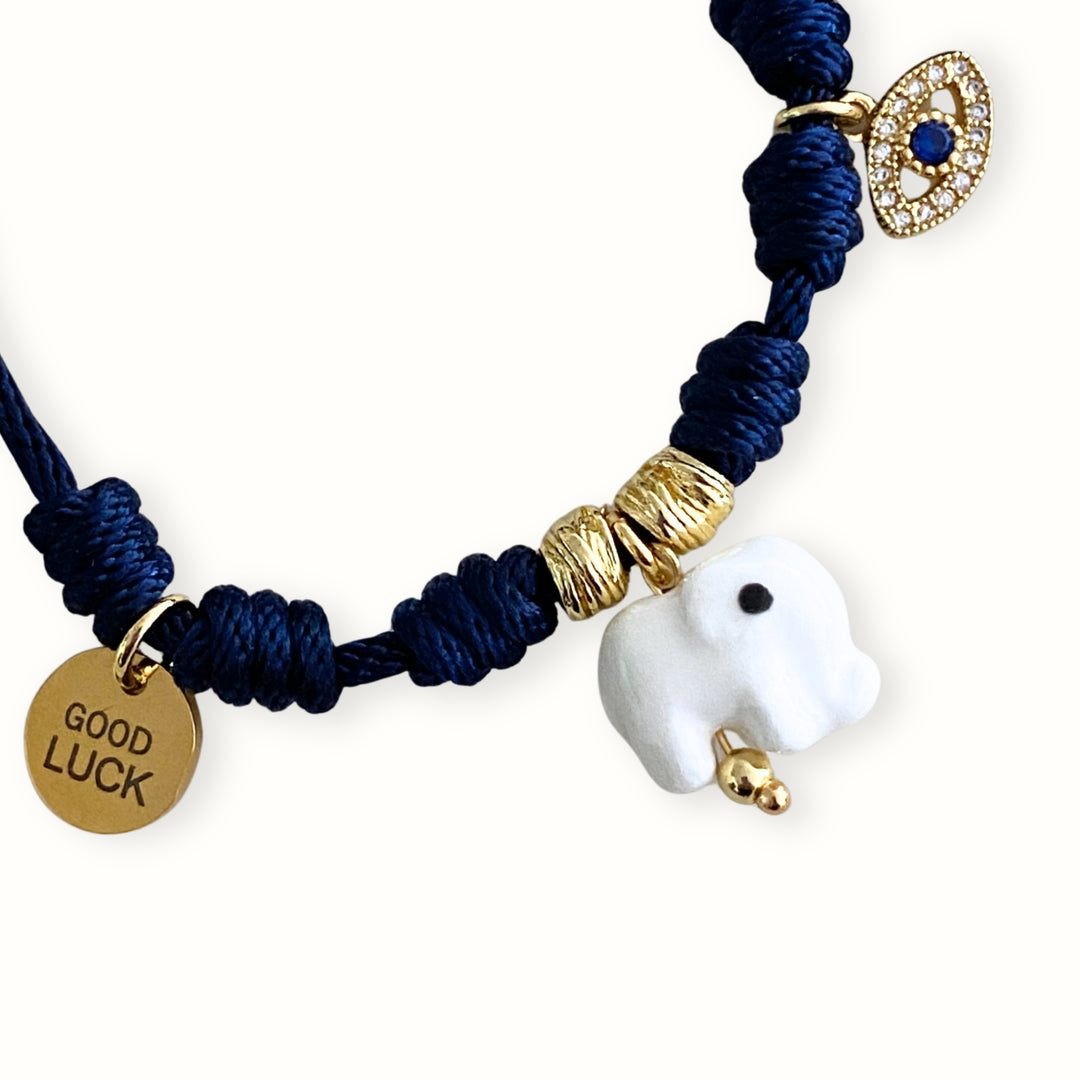 Detalles de Pulsera ajustable con cordón trenzado y dijes de ojo con zirconia y elefante.