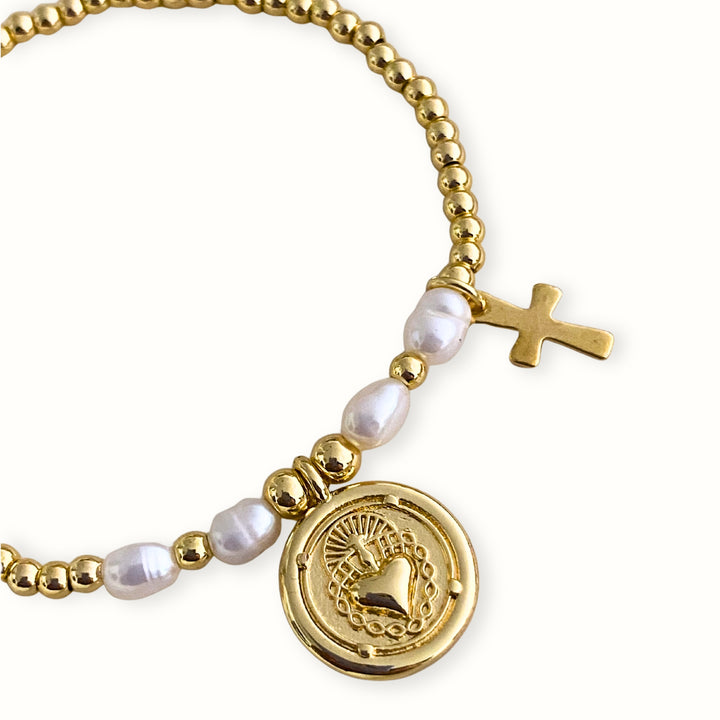 Detalles de Brazalete religioso con Sagrado Corazón, cruz y perla de río