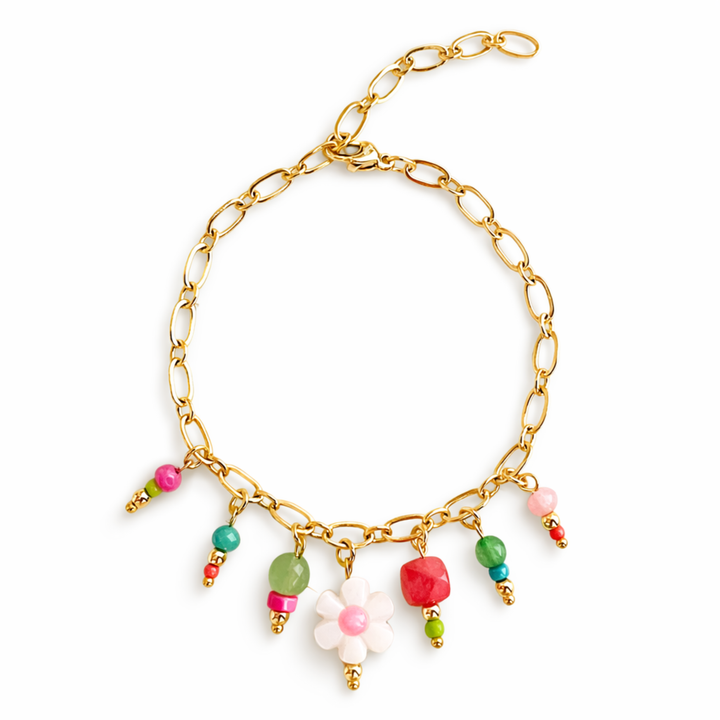 Detalles de Brazalete con flor de madre perla, piedras naturales y chaquira de chapa de oro