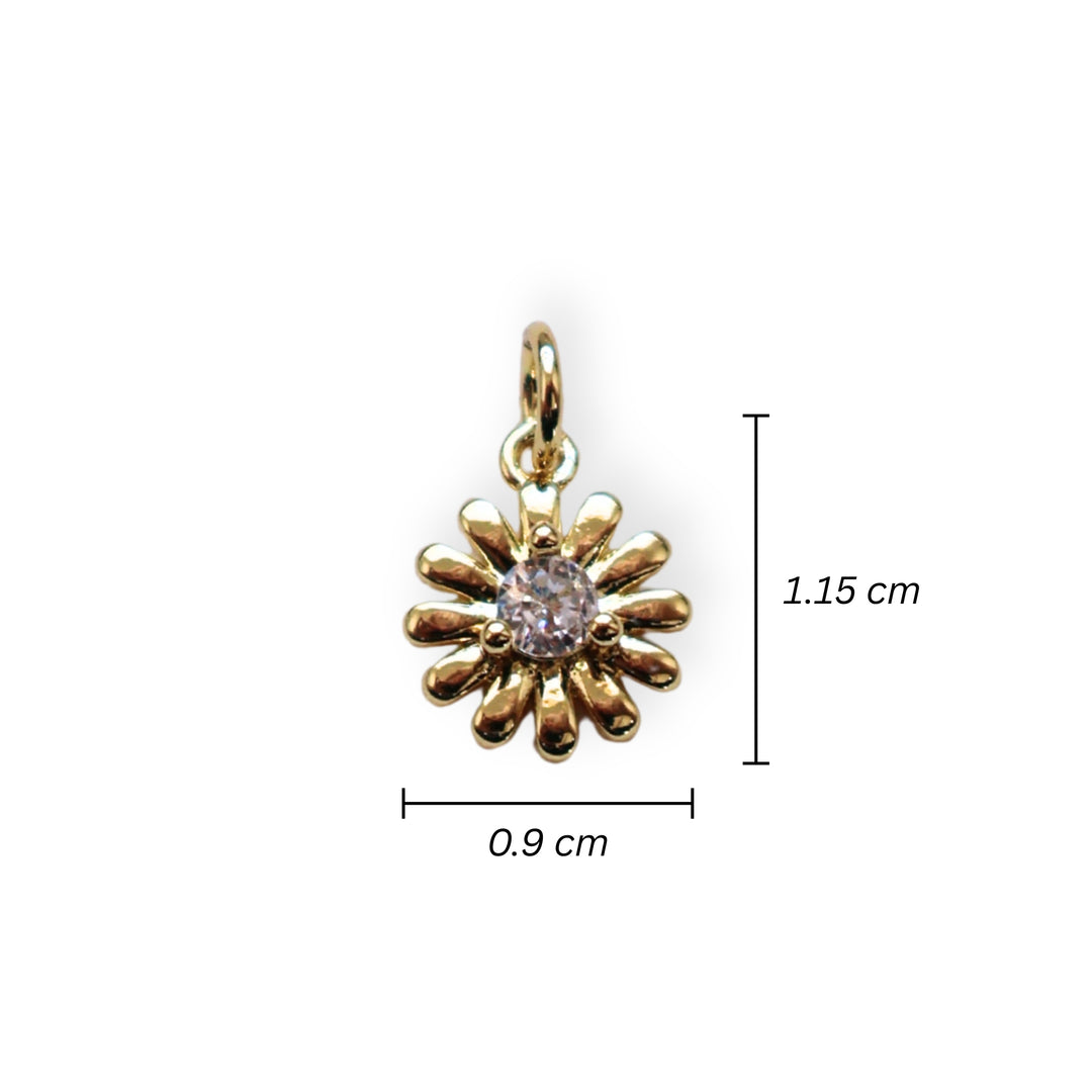 Medida para dije dorado en forma de flor con zirconia brillante al centro