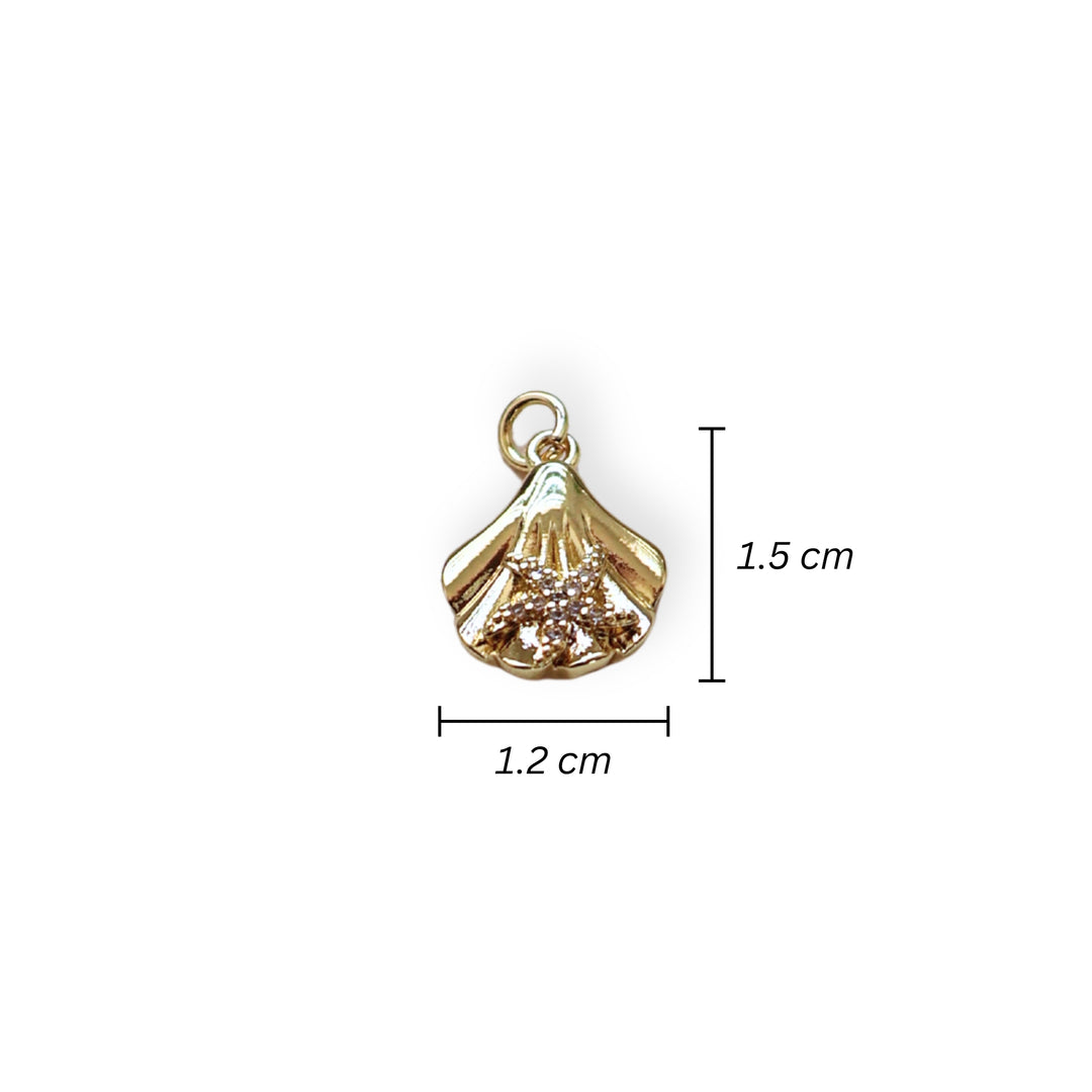 Medidas para dije concha dorada en chapa de oro con estrella de zirconia