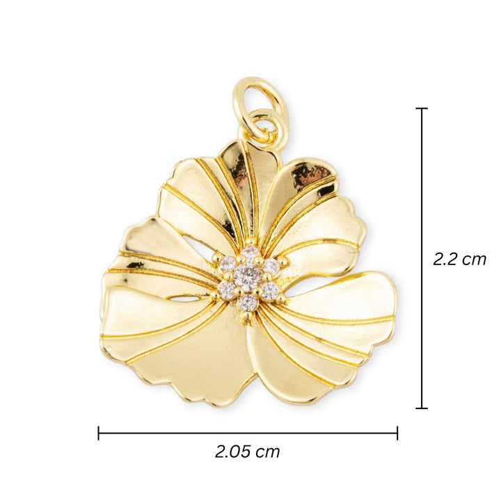 Medidas para Dije flor dorada en chapa de oro con zirconia en el centro