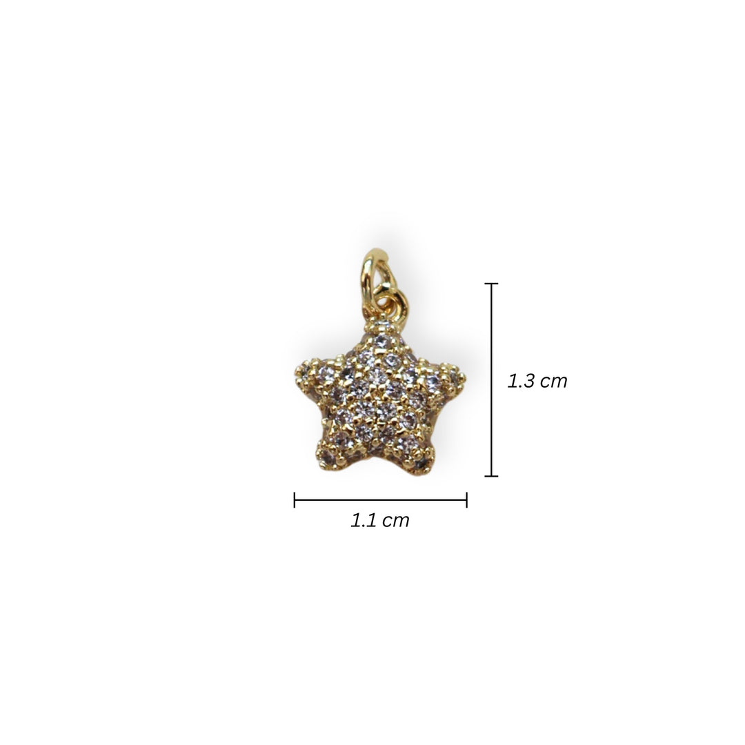 Medidas para dije dorado en forma de estrella con zirconia