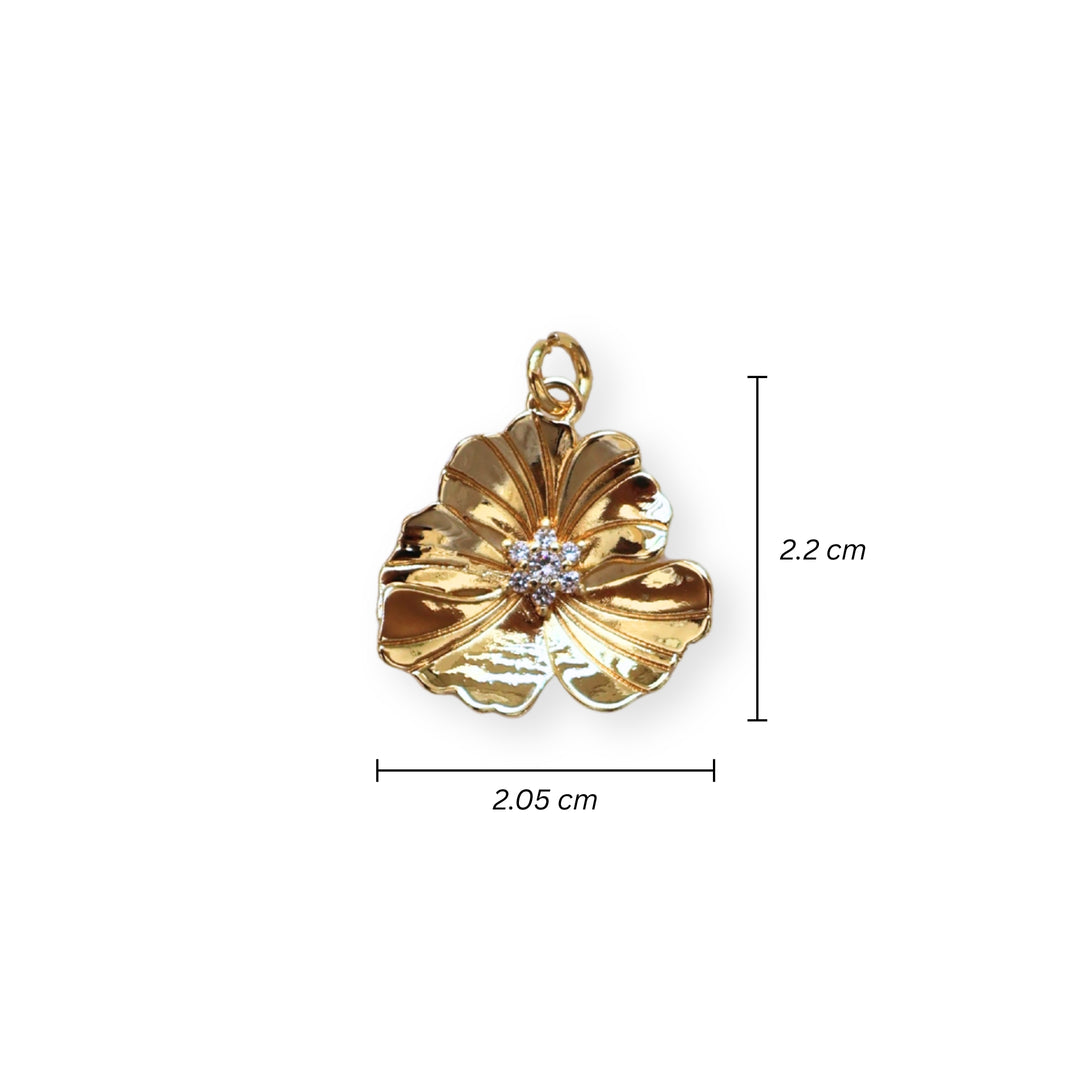Medidas para dije flor dorada en chapa de oro con zirconia en el centro