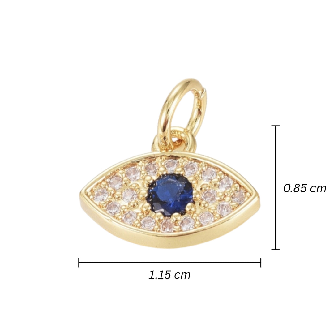 Medidas para Dije en forma de ojo dorado en chapa de oro con zirconia al centro