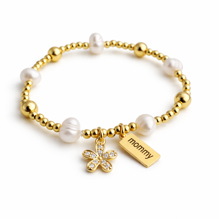 Detalles de Brazalete Luzia con perla de río, dije Mommy y flor de chapa de oro con zirconia