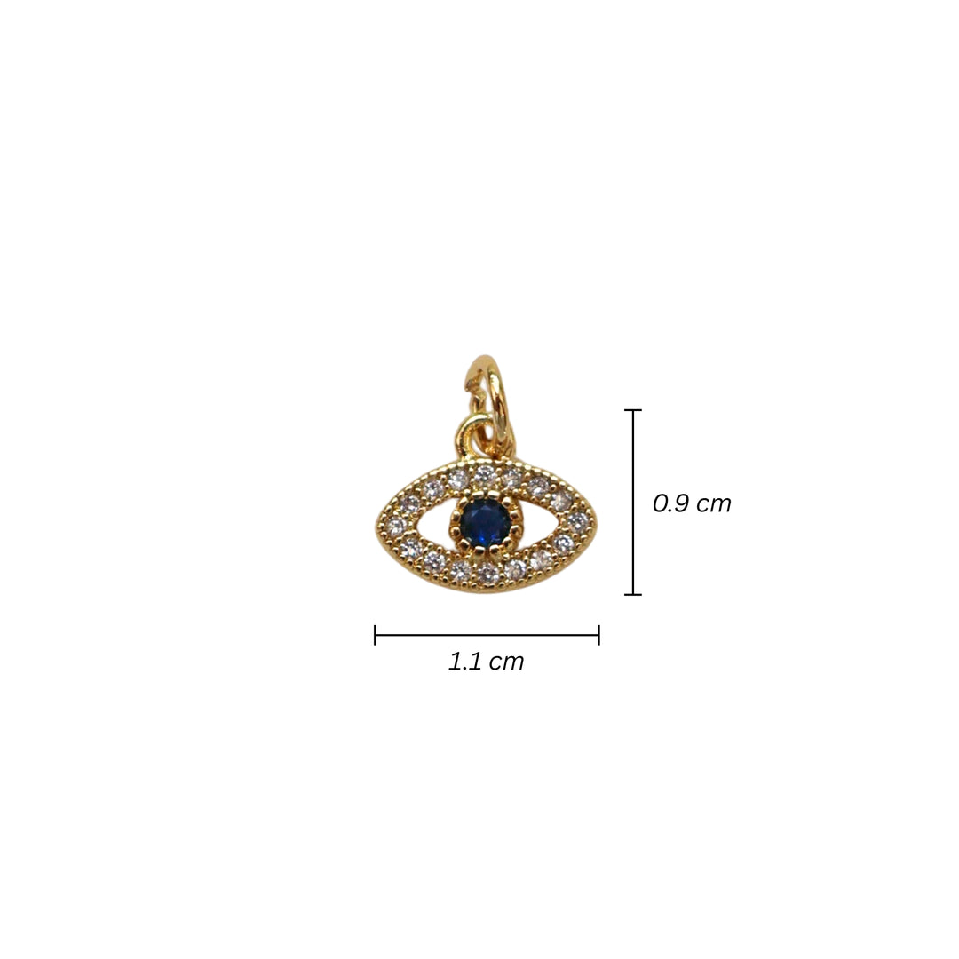 Medidas para dije dorado en forma de ojo con zirconias y centro azul oscuro