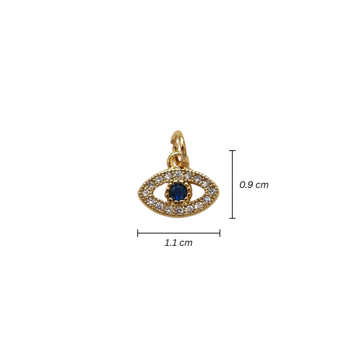 Medidas para dije dorado en forma de ojo con zirconias y centro azul oscuro