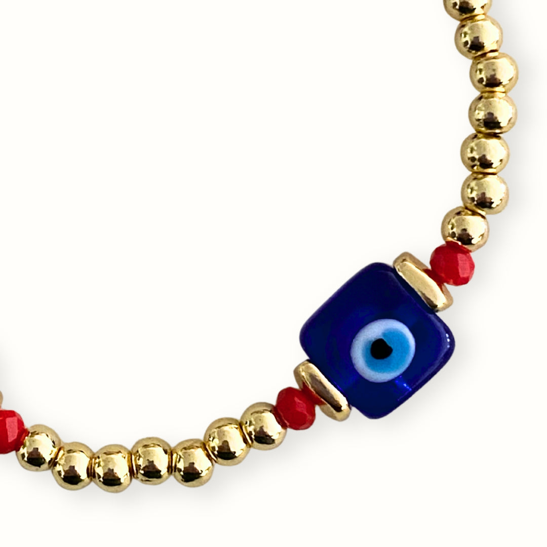 Detalles de Pulsera elástica con ojo turco de murano y cristal facetado.
