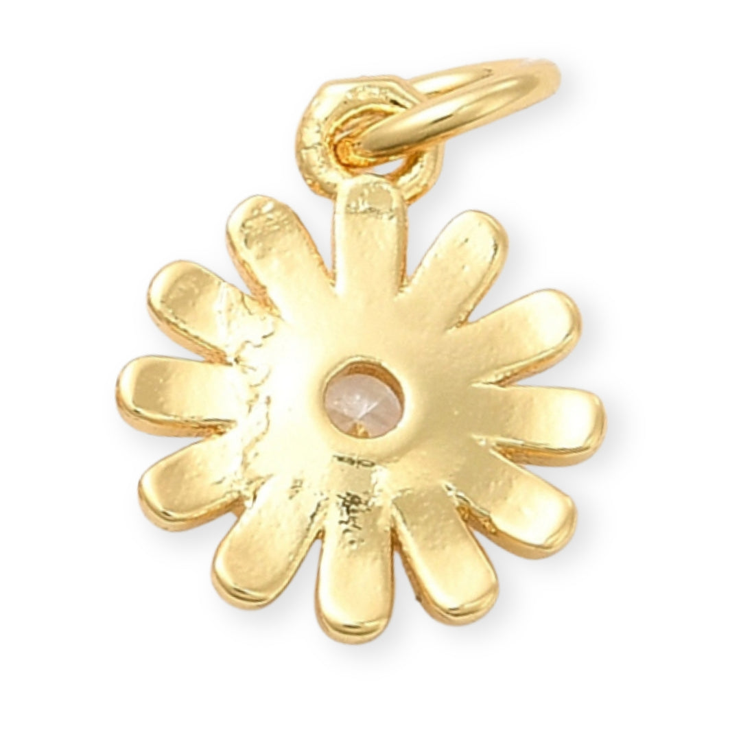 Detalles de Dije dorado en forma de flor con zirconia brillante al centro