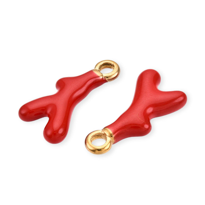 Detalles de Dije coral dorado esmaltado sobre fondo blanco