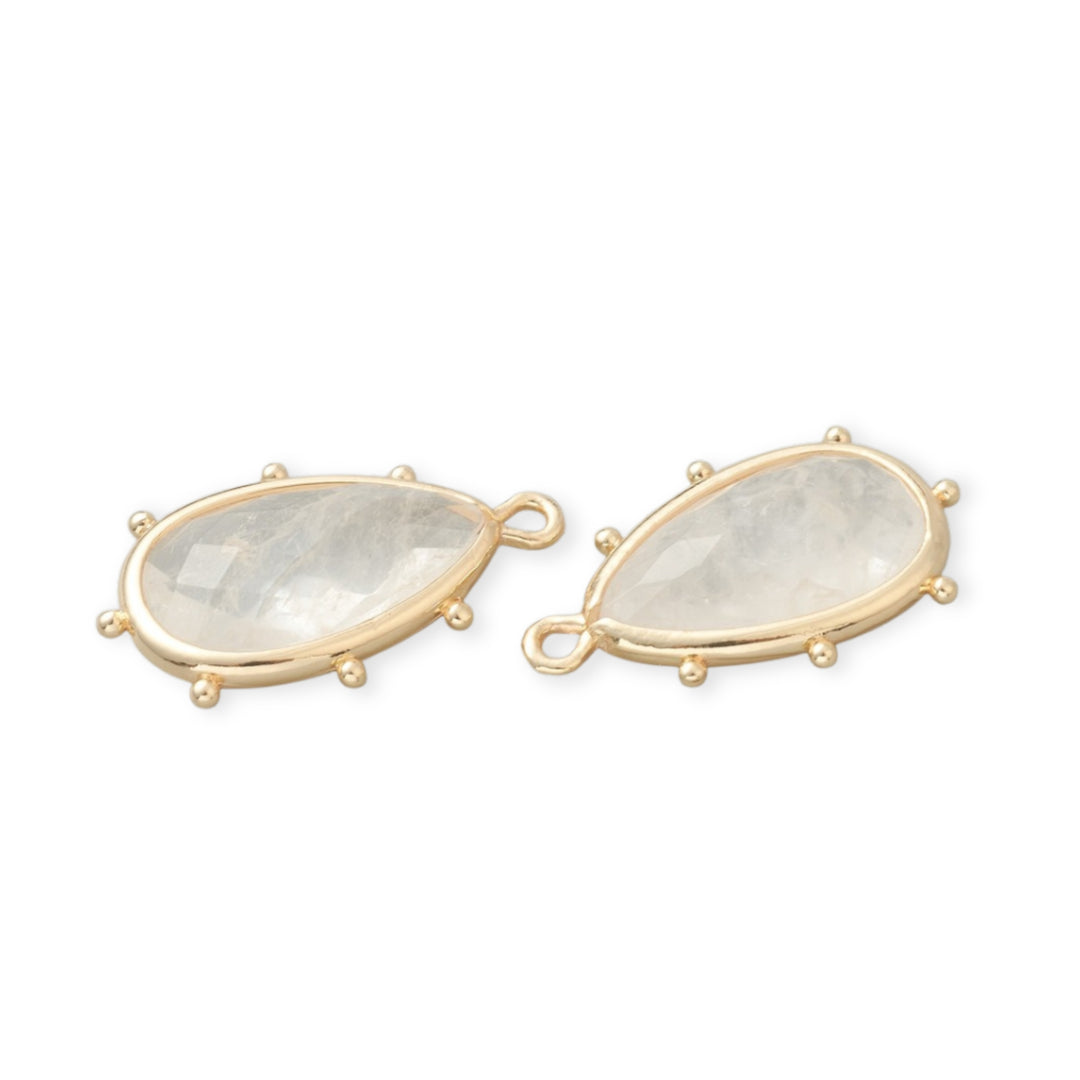 Detalles de Dije en forma de gota de cuarzo natural con base de chapa de oro 