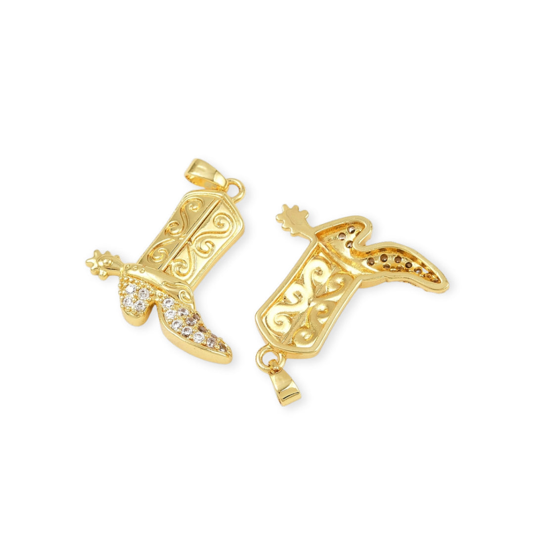 Detalles de Dije dorado en forma de bota con zirconias incrustadas