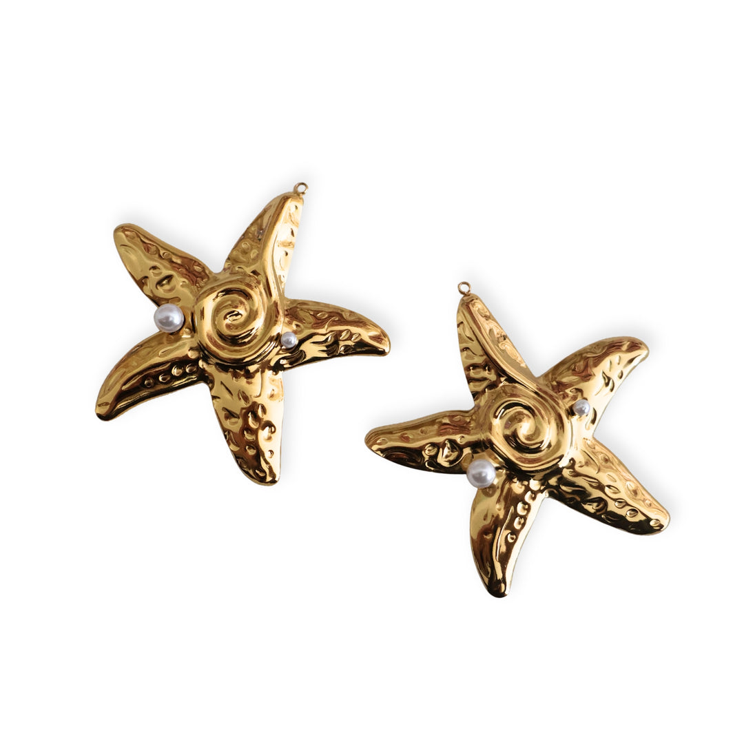 Detalles de dijes de acero inoxidable en forma de estrella de mar con dos perlas sintéticas decorativas