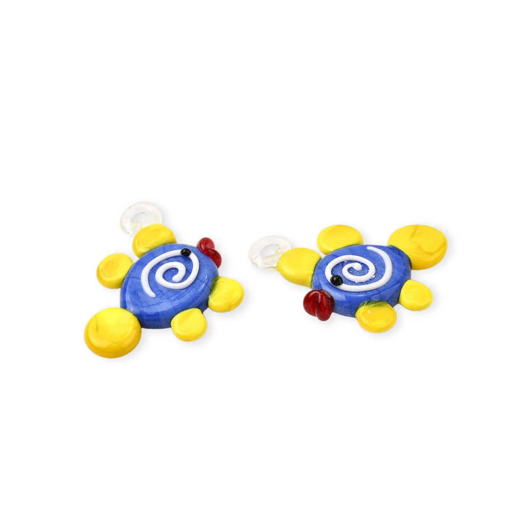 Detalles de Dije de murano en forma de pez amarillo con azul y espiral blanca