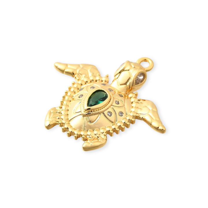 Detalles de Dije tortuga en chapa de oro con zirconia brillante al centro